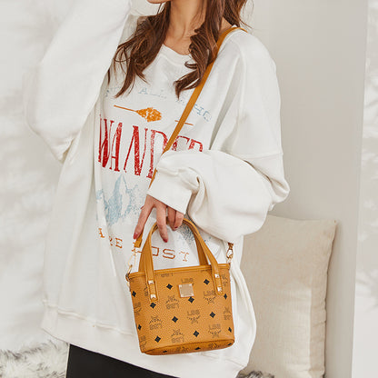 2023 new spring and summer easy-to-match Internet celebrity same style portable temperament goddess fashion crossbody mini vegetable basket tote bag 