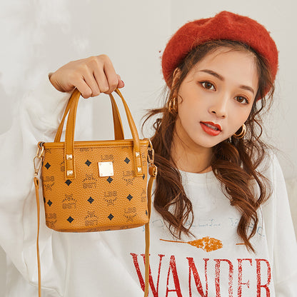 2023 new spring and summer easy-to-match Internet celebrity same style portable temperament goddess fashion crossbody mini vegetable basket tote bag 