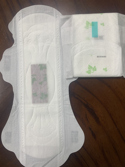 Hot air super soft non-woven surface sanitary napkin