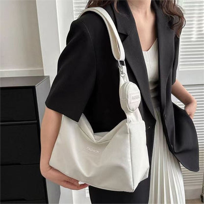 2023 new crossbody bag student class bag female ins style Japanese style large capacity solid color mother-in-law bag shoulder bag 