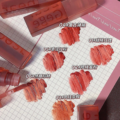 Gege bear Gege bear velvet lip glaze ကတ္တီပါနူးညံ့သော matte matte ကြာရှည်ခံပြီး ဆောင်းဦးနှင့် ဆောင်းရာသီ နှုတ်ခမ်းနီကို အရောင်မှိန်ရန်မလွယ်ကူပါ။ 