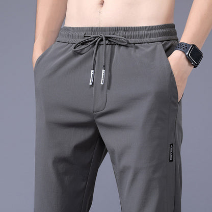 2023 Summer Ice Silk Thin Sports Pants Men's Straight Loose Elastic Non-ironing Casual Pants Workwear Pants Wholesale