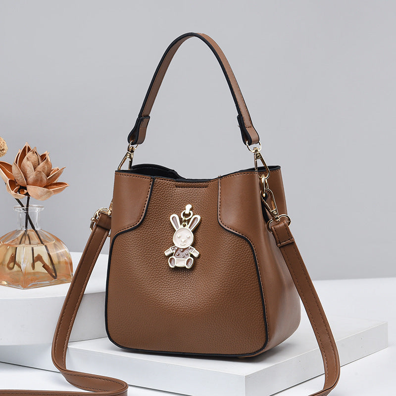 2023 New Bucket Women's Bag Retro Fashion ကိုရီးယားစတိုင် ခေတ်မှီရိုးရှင်းပြီး ဆွဲဆောင်မှုရှိသော ပခုံးတစ်ဖက်တည်း Crossbody လက်ကိုင်အိတ် တစ်ပိုင်း Dropshipping 