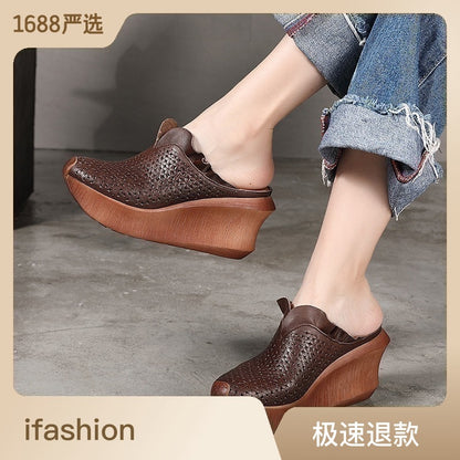 Manufacturers leather casual ethnic style sandals retro hollowed out muffin wedge slippers handmade women's shoes explosive wholesale 