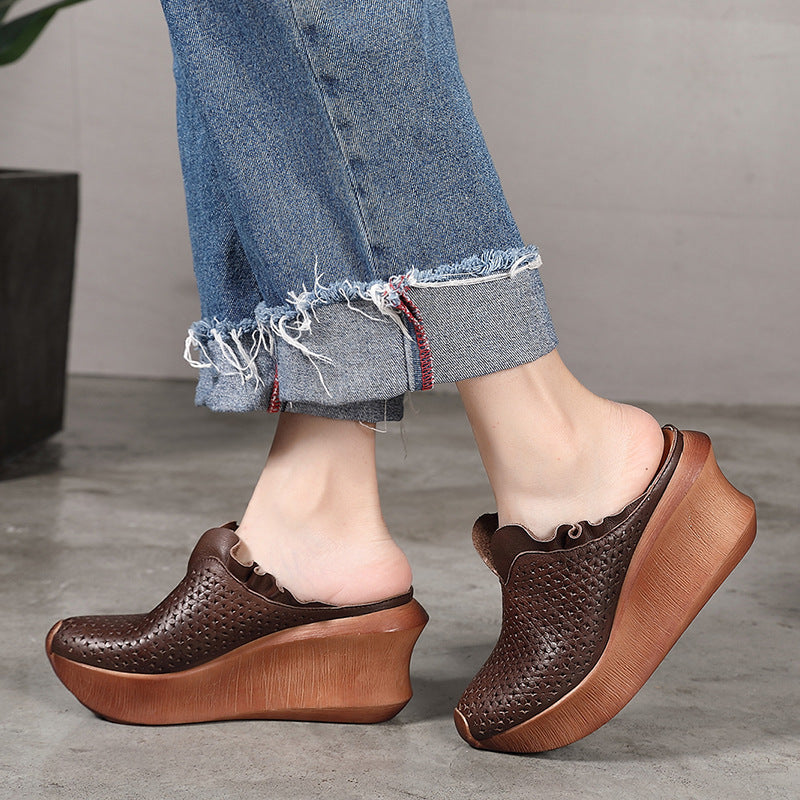 Manufacturers leather casual ethnic style sandals retro hollowed out muffin wedge slippers handmade women's shoes explosive wholesale 