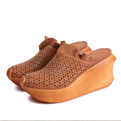 Manufacturers leather casual ethnic style sandals retro hollowed out muffin wedge slippers handmade women's shoes explosive wholesale 