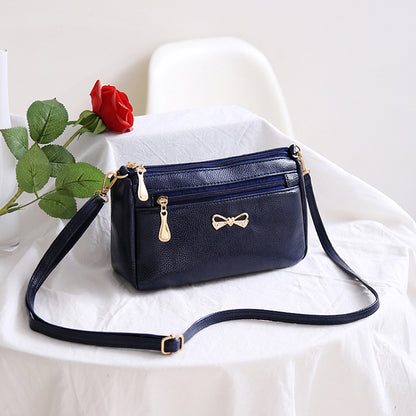 The new mother's trendy handbags pure color pu ladies diagonal shoulder bag bowknot soft leather small bag stall wholesale