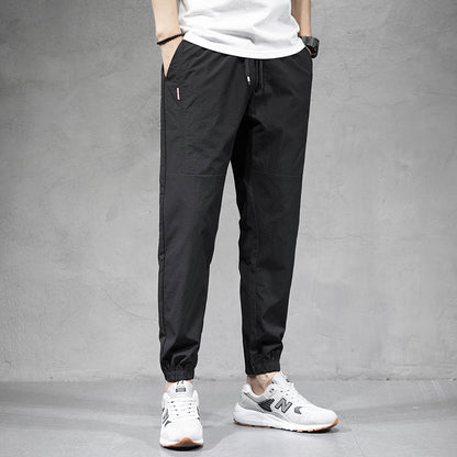 Ice Silk Sports Pants Men's Overalls Loose Large Size Harem Pants Youth Non-ironing Nine-point Casual Pants Wholesale 