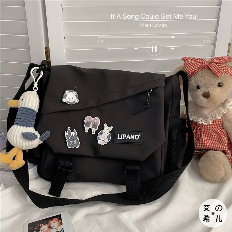 Korean ins style large capacity shoulder bag men's Japanese Harajuku retro tooling postman bag girl student Messenger bag 