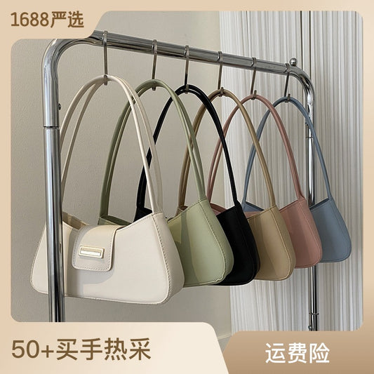 High-quality French-style niche bags 2024 new women's bags solid color popular crossbody shoulder underarm bag baguette bag 