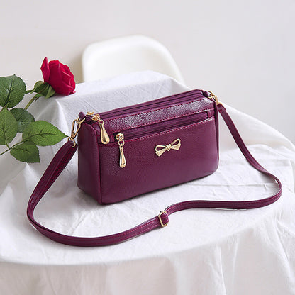 The new mother's trendy handbags pure color pu ladies diagonal shoulder bag bowknot soft leather small bag stall wholesale