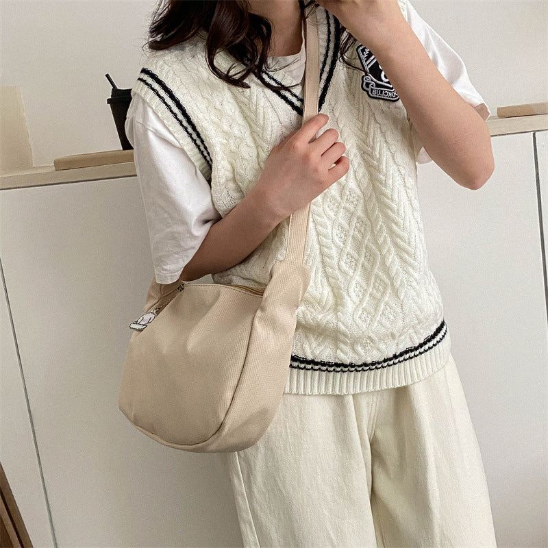 Korean version of the new candy-colored waffle literary cross-border student versatile simple daily ladies shoulder crossbody bag 