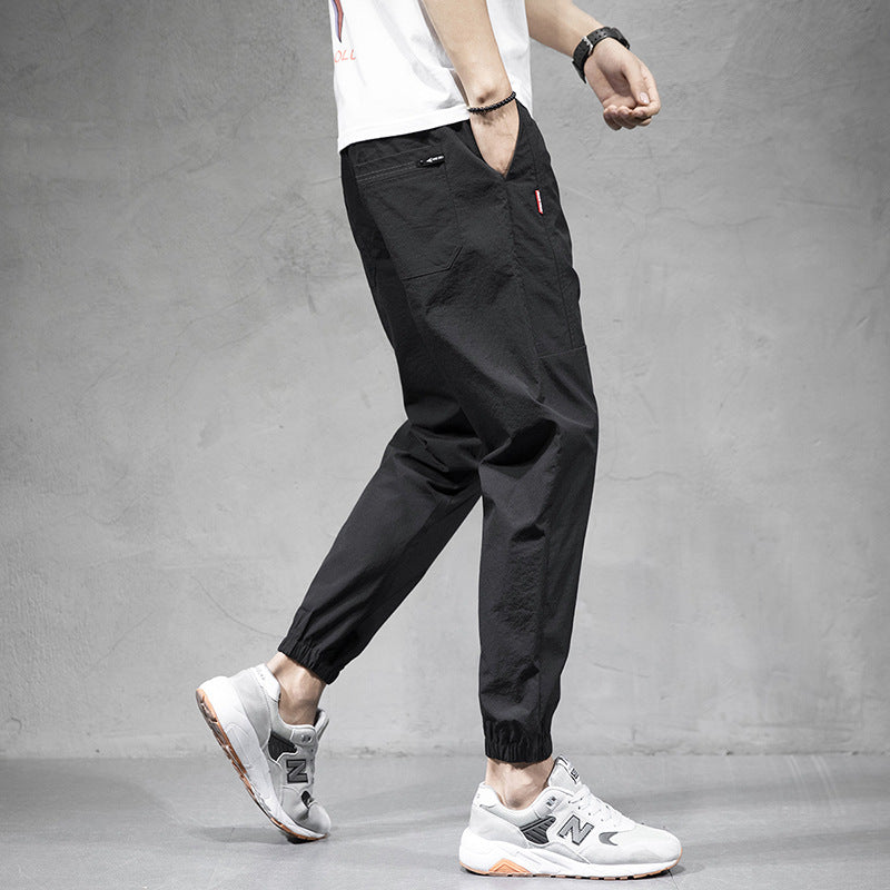 Ice Silk Sports Pants Men's Overalls Loose Large Size Harem Pants Youth Non-ironing Nine-point Casual Pants Wholesale 