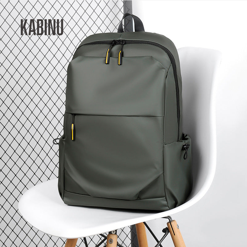 Kabinu casual backpack outdoor travel bag solid color leather film computer bag middle school student school bag business backpack trend 