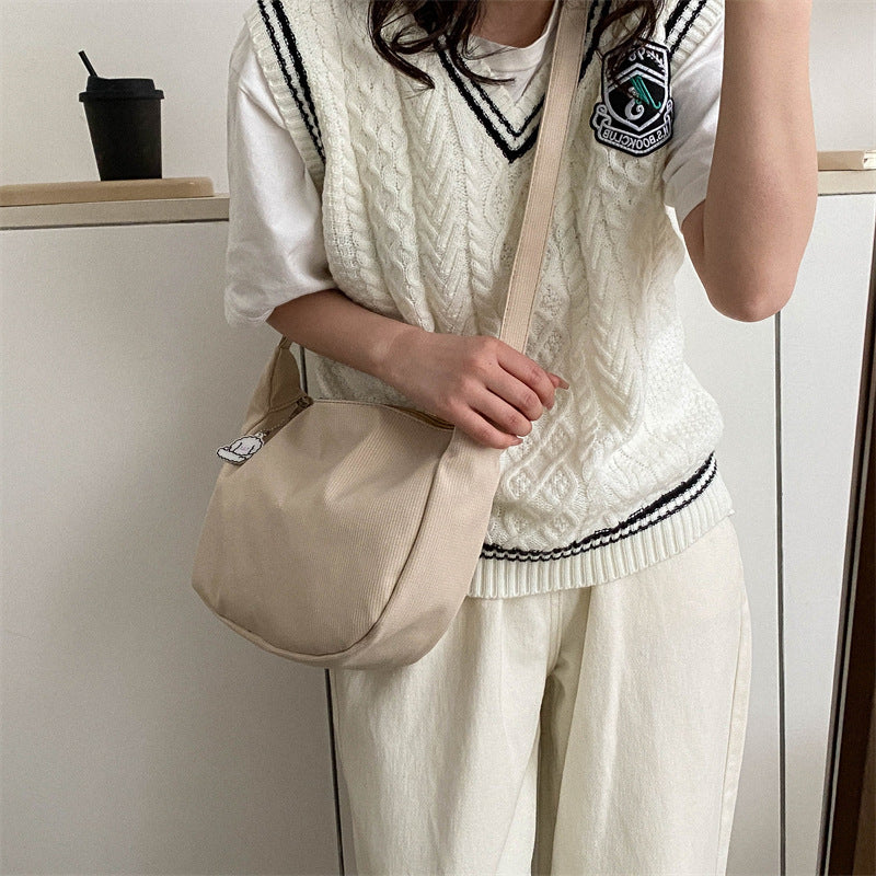 Korean version of the new candy-colored waffle literary cross-border student versatile simple daily ladies shoulder crossbody bag 