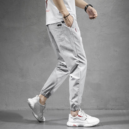 Ice Silk Sports Pants Men's Overalls Loose Large Size Harem Pants Youth Non-ironing Nine-point Casual Pants Wholesale 