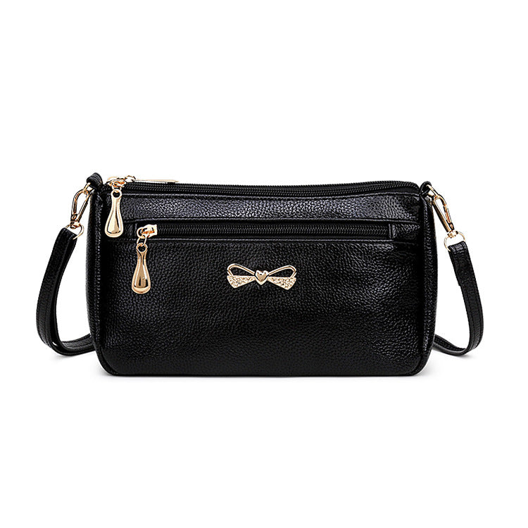 The new mother's trendy handbags pure color pu ladies diagonal shoulder bag bowknot soft leather small bag stall wholesale