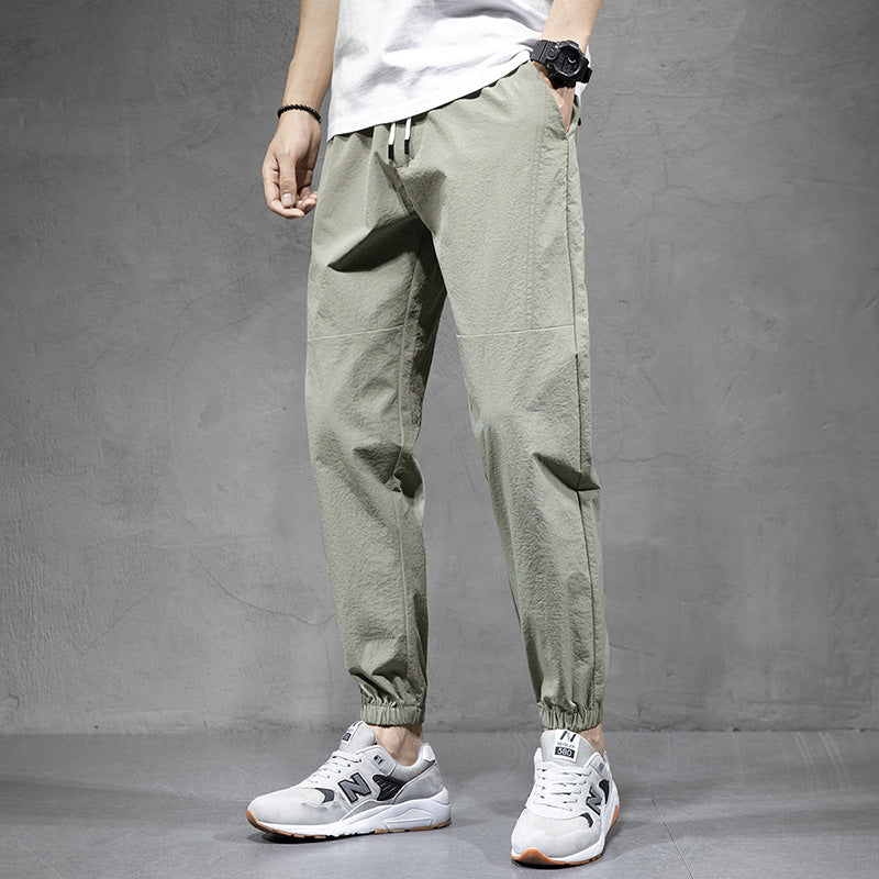 Ice Silk Sports Pants Men's Overalls Loose Large Size Harem Pants Youth Non-ironing Nine-point Casual Pants Wholesale 