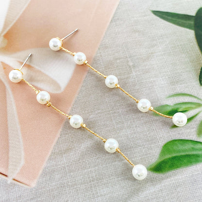 Simple imitation pearl tassel earrings niche design high-end ins style earrings fashion all-match face-lift earrings 