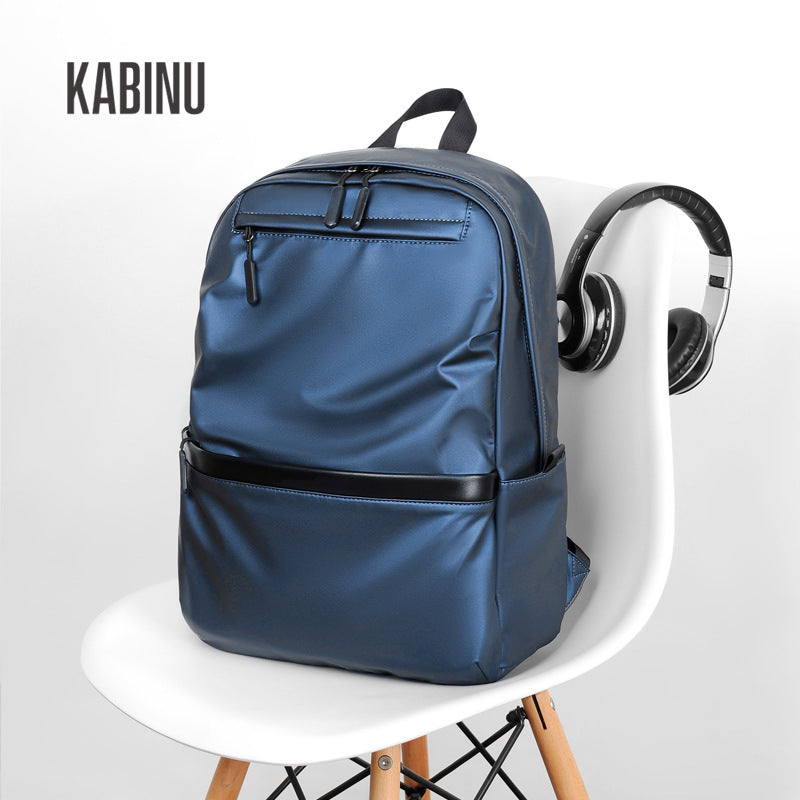 Kabinu casual backpack leather film solid color water-repellent computer backpack work business logo middle school student school bag 