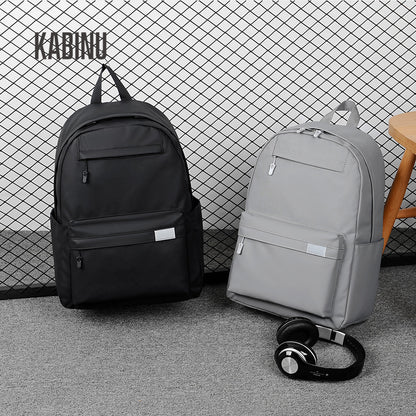 Kabinu casual backpack leather membrane water-repellent student school bag solid color business commuter computer backpack backpack 