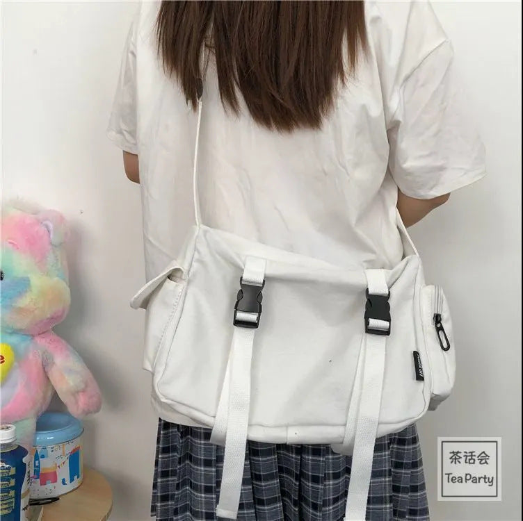 Korean Chic retro tooling Hong Kong style student canvas bag male ulzzang neutral Japanese Harajuku Messenger bag female 