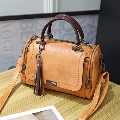 2023 New Korean Style Easy to Match Retro Bag Shoulder Bag Crossbody Bag Boston Pillow Bag Women’s Handheld Tassel Bag 