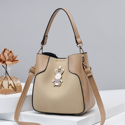 2023 New Bucket Women's Bag Retro Fashion ကိုရီးယားစတိုင် ခေတ်မှီရိုးရှင်းပြီး ဆွဲဆောင်မှုရှိသော ပခုံးတစ်ဖက်တည်း Crossbody လက်ကိုင်အိတ် တစ်ပိုင်း Dropshipping 