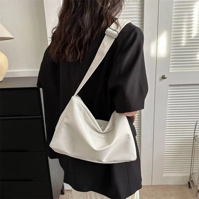 2023 new crossbody bag student class bag female ins style Japanese style large capacity solid color mother-in-law bag shoulder bag 