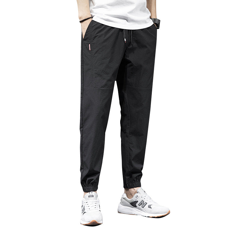 Ice Silk Sports Pants Men's Overalls Loose Large Size Harem Pants Youth Non-ironing Nine-point Casual Pants Wholesale 