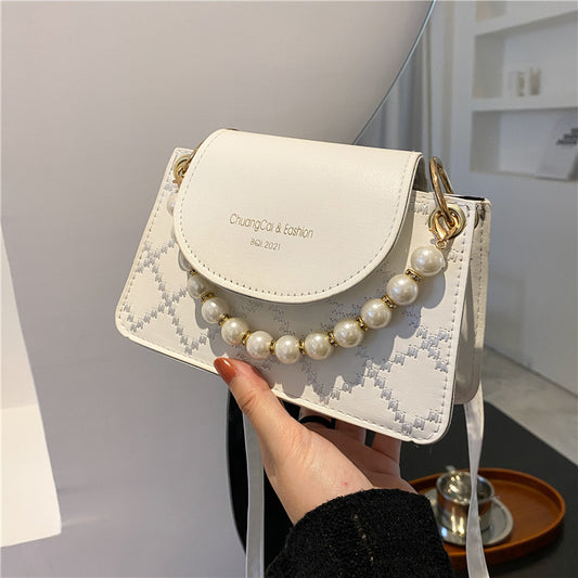 Simple stitching color popular small bag summer 2021 new retro fashion messenger bag pearl hand carry small square bag 