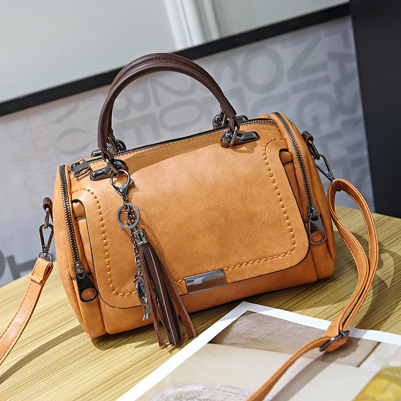 2023 New Korean Style Easy to Match Retro Bag Shoulder Bag Crossbody Bag Boston Pillow Bag Women’s Handheld Tassel Bag 