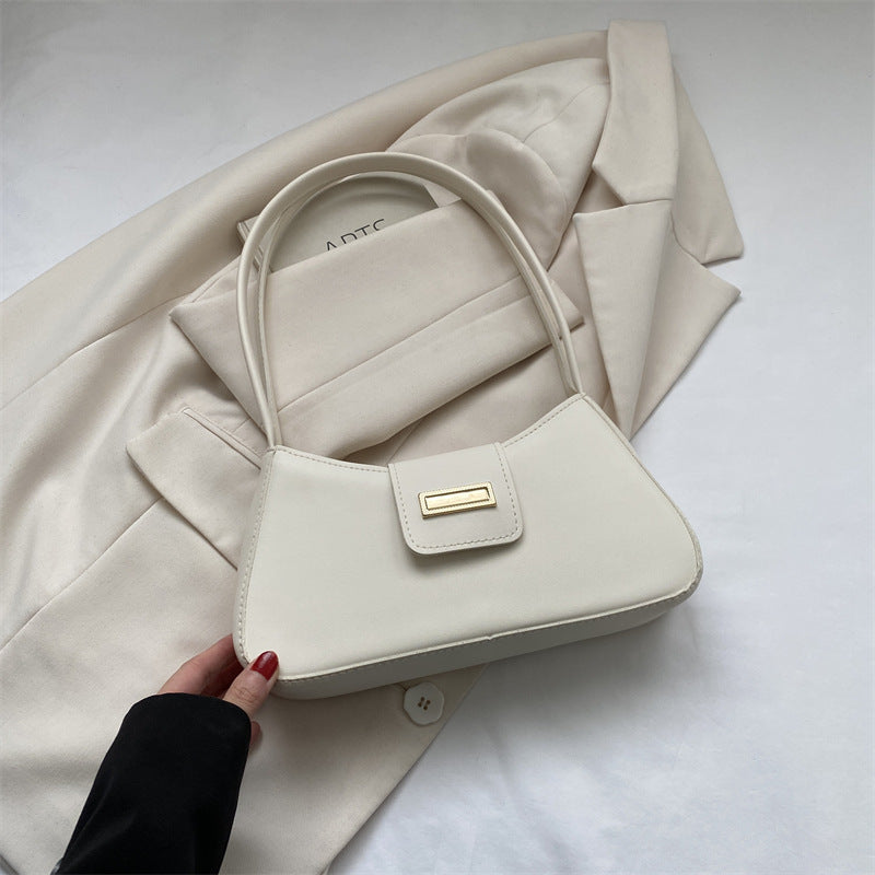 High-quality French-style niche bags 2024 new women's bags solid color popular crossbody shoulder underarm bag baguette bag 