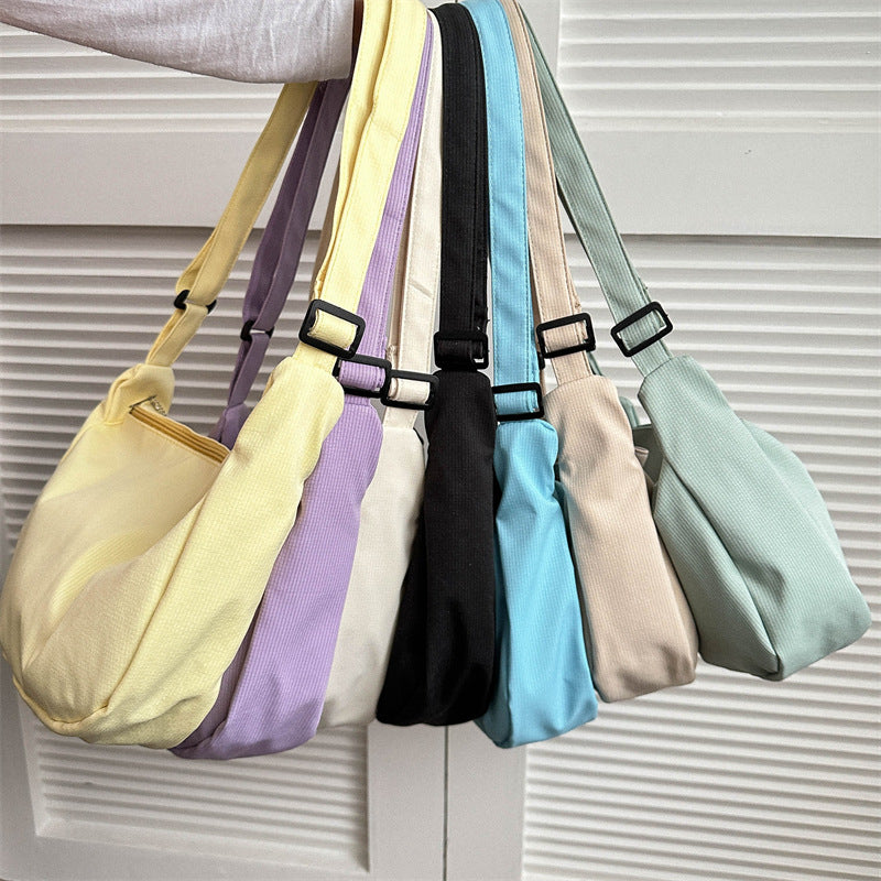 Korean version of the new candy-colored waffle literary cross-border student versatile simple daily ladies shoulder crossbody bag 