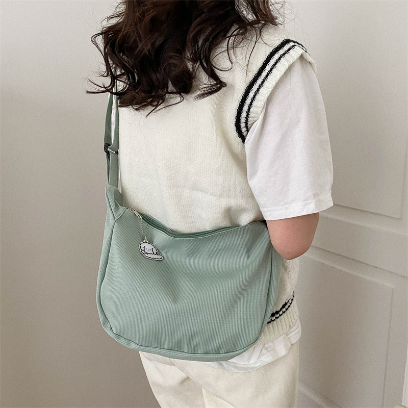 Korean version of the new candy-colored waffle literary cross-border student versatile simple daily ladies shoulder crossbody bag 