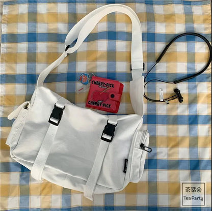 Korean Chic retro tooling Hong Kong style student canvas bag male ulzzang neutral Japanese Harajuku Messenger bag female 