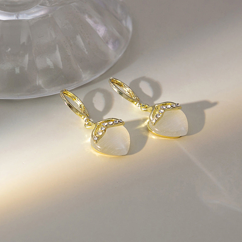 Japanese and Korean diamond-encrusted geometric earrings niche light luxury high-end pearl oil dripping bow earrings wholesale 