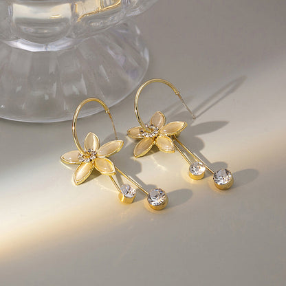 Japanese and Korean diamond-encrusted geometric earrings niche light luxury high-end pearl oil dripping bow earrings wholesale 