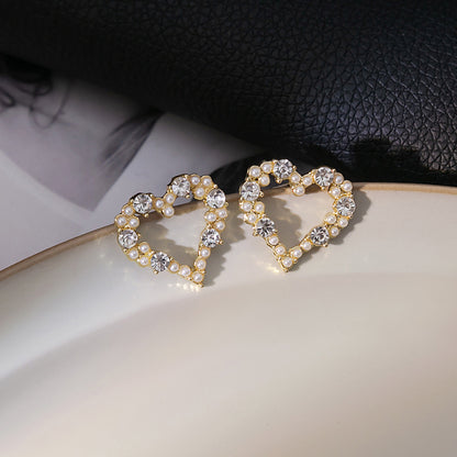 Japanese and Korean diamond-encrusted geometric earrings niche light luxury high-end pearl oil dripping bow earrings wholesale 