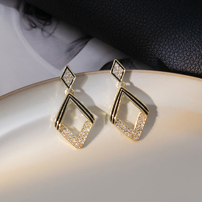 Japanese and Korean diamond-encrusted geometric earrings niche light luxury high-end pearl oil dripping bow earrings wholesale 