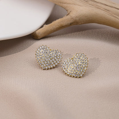 Japanese and Korean diamond-encrusted geometric earrings niche light luxury high-end pearl oil dripping bow earrings wholesale 