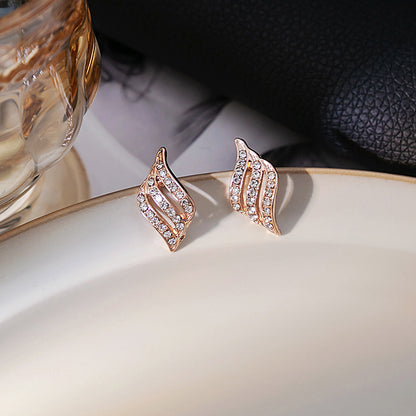 Japanese and Korean diamond-encrusted geometric earrings niche light luxury high-end pearl oil dripping bow earrings wholesale 