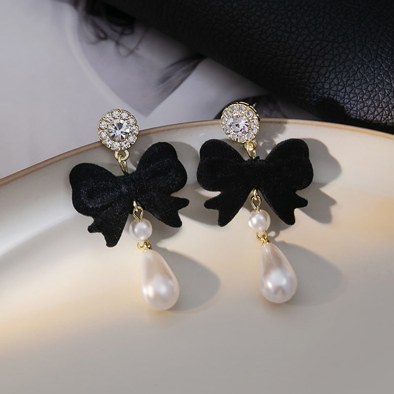 Japanese and Korean diamond-encrusted geometric earrings niche light luxury high-end pearl oil dripping bow earrings wholesale 